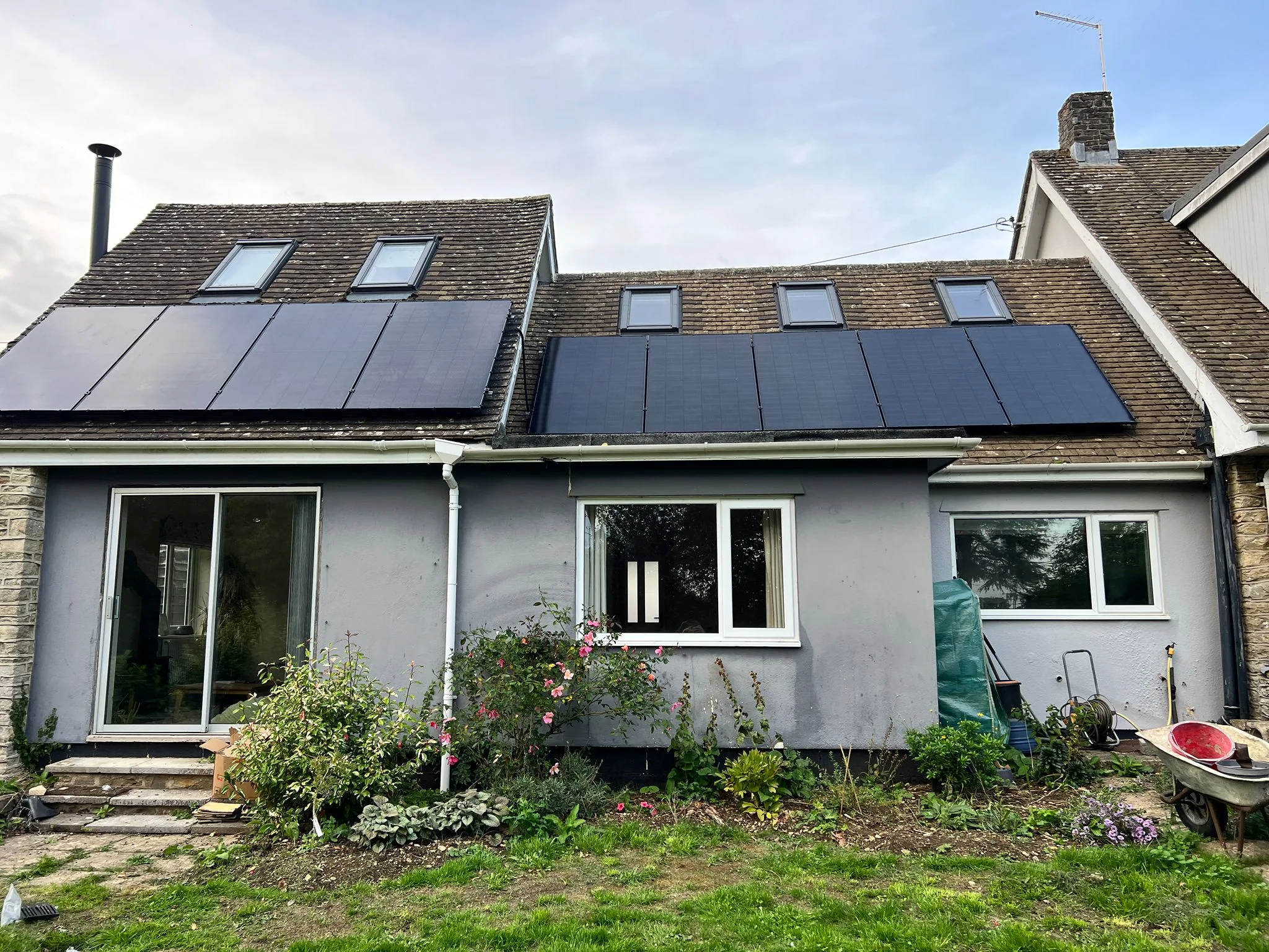 Rooftop solar panels on a house, representing Coventry