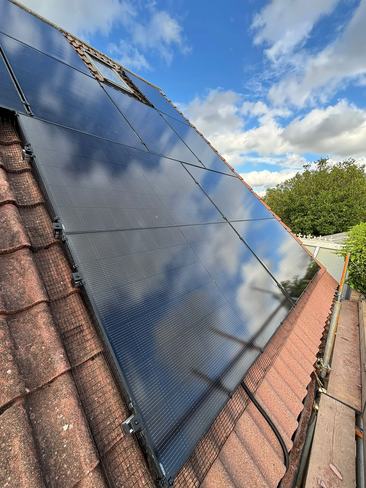 Solar panels on a home roof in Cambridgeshire: 14 panels, 6.65 kWp