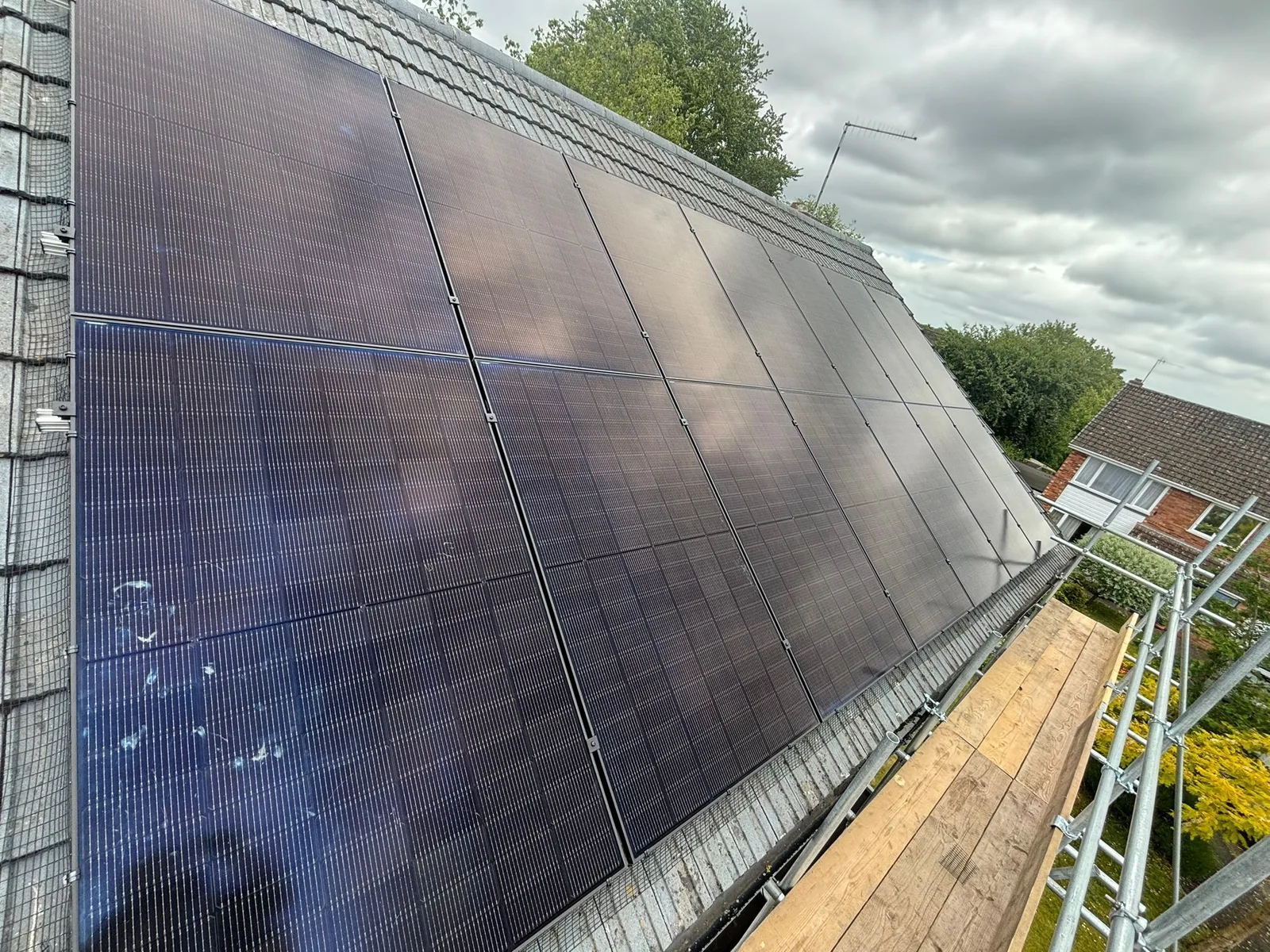 Solar panels on a home roof in Coventry: 14 panels, 7 kWp
