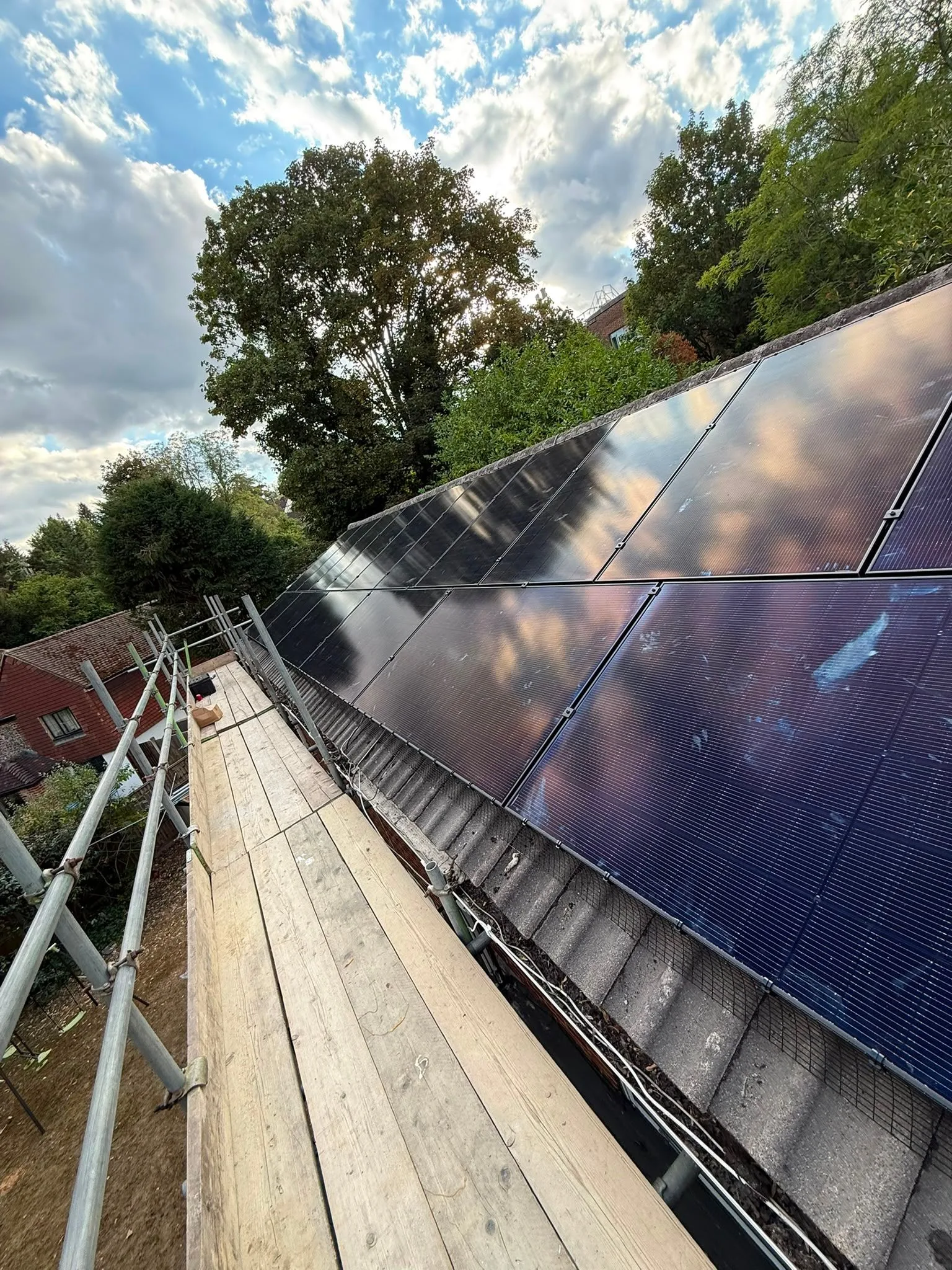 Solar panels on a home roof in London: 16 panels, 8 kWp