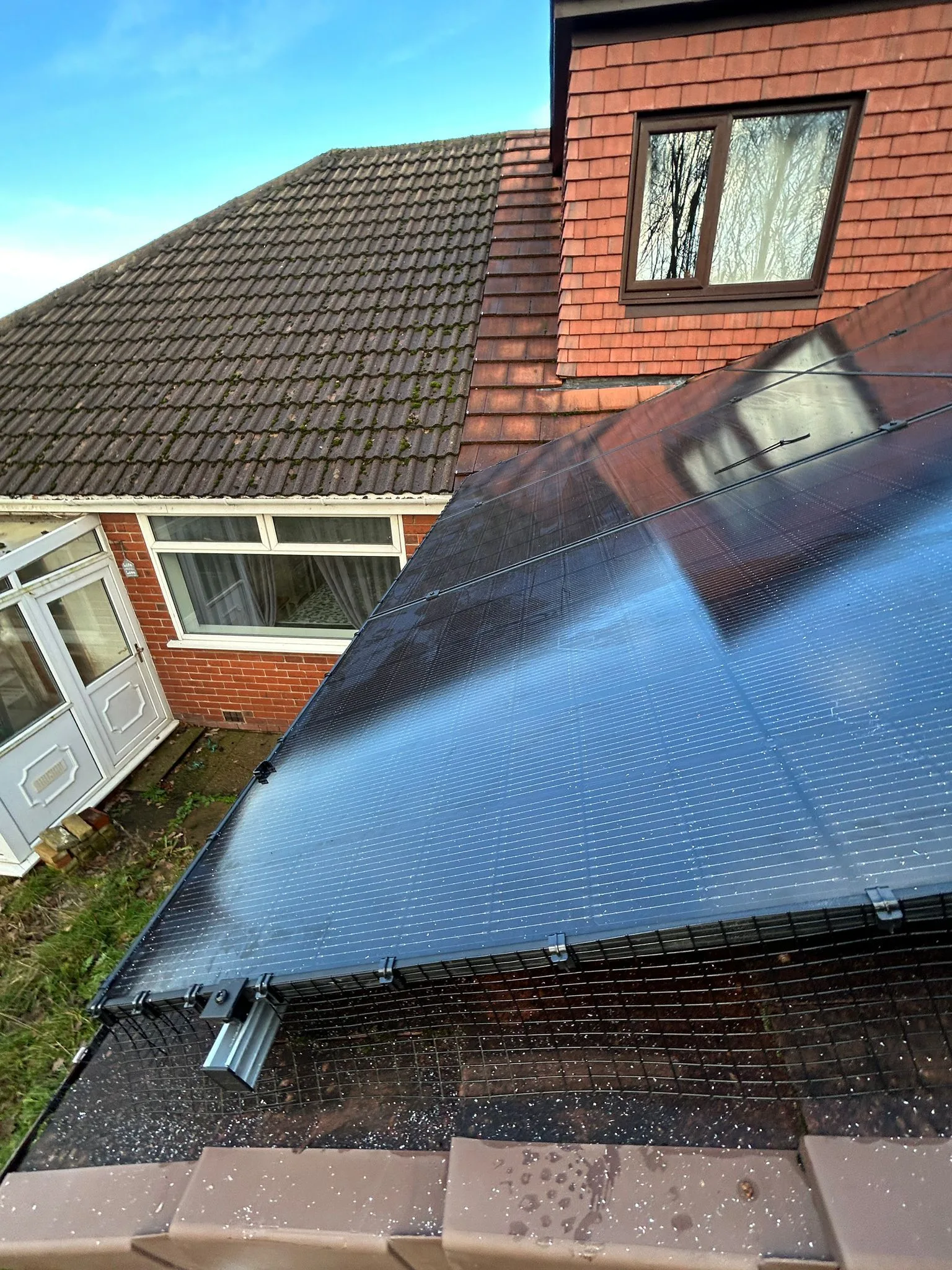 Solar panels on a home roof in Greater Manchester: 12 panels, 5.7 kWp