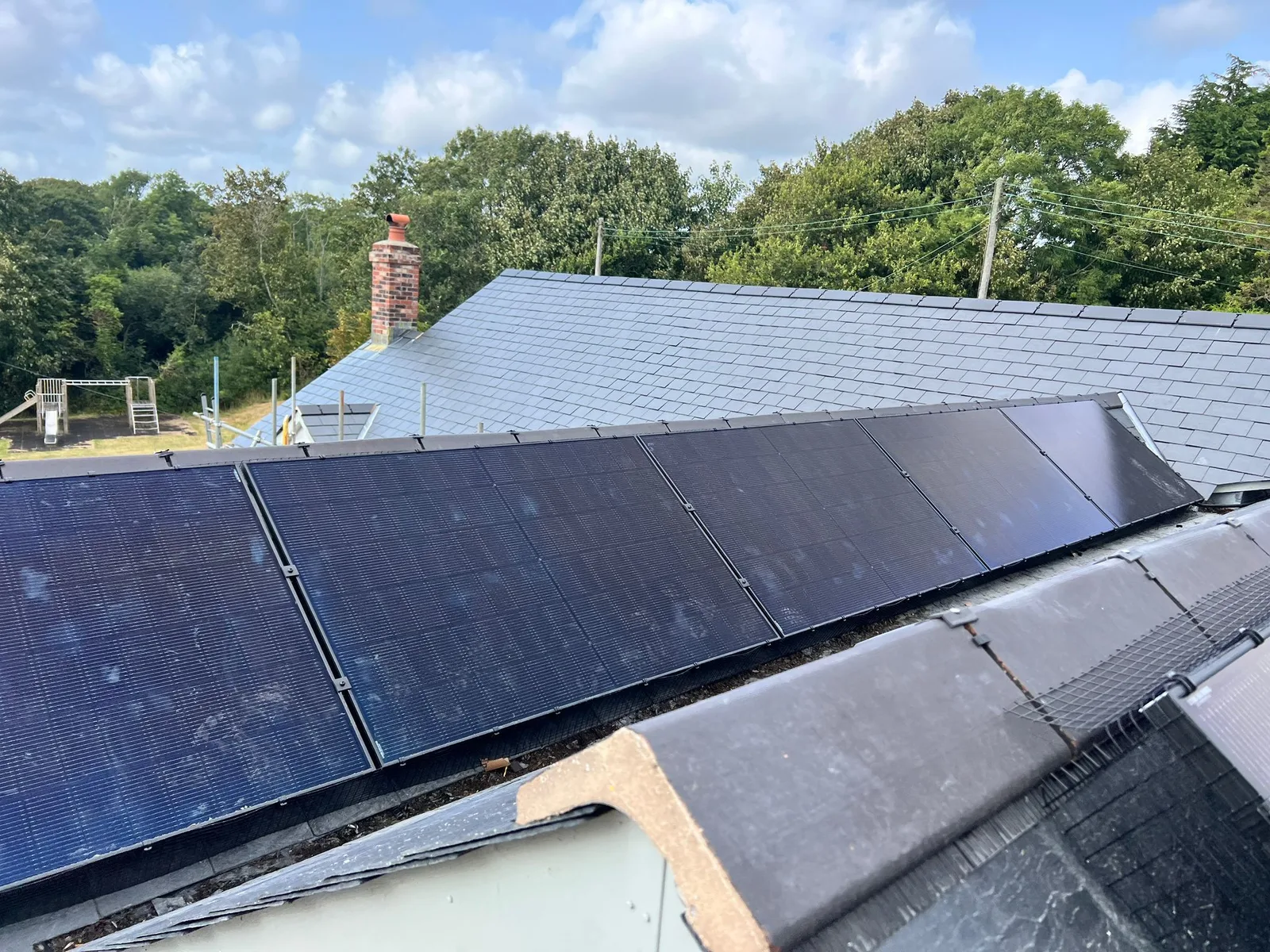 Solar panels on a home roof in South West Wales: 23 panels, 10.35 kWp