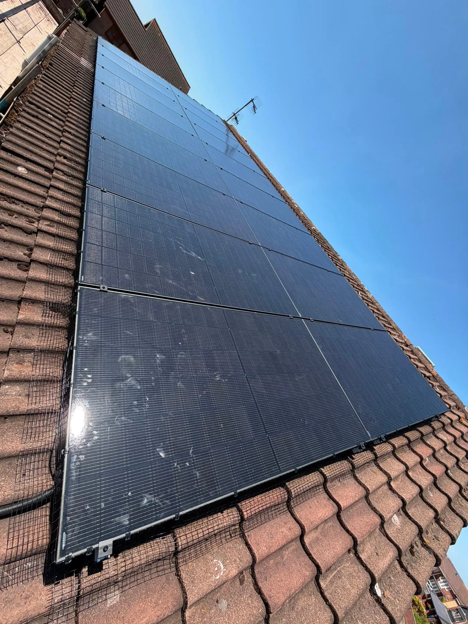 Solar panels on a home roof in Neath Port Talbot: 18 panels, 9 kWp